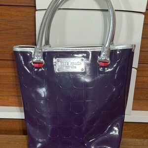 Kate Spade New York Purple Patent Leather Embossed Silver Handles Red Lining